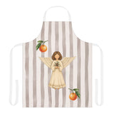 Angels and oranges Christmas apron laid flat, showing the angel and pine sprig on a soft grey stripe with an orange above and below