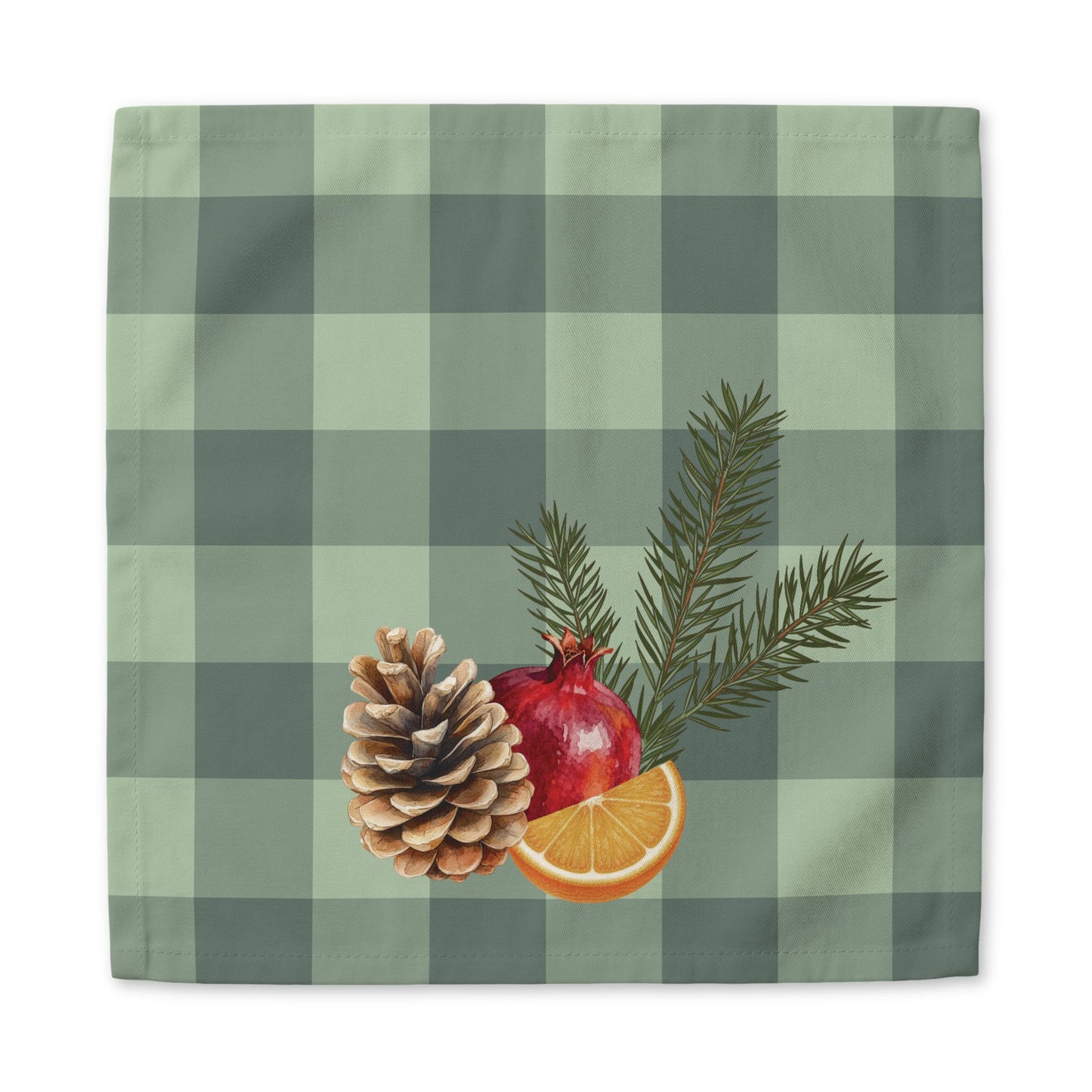 Pomegranate & Pine Gingham Christmas cloth napkin, a pomegranate, pine cone, orange slice and gold star under a pine spray on a sage green gingham check