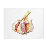 Garlic placemat laid flat, showing a watercolor head of garlic on white cotton twill