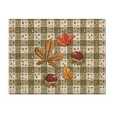 Chestnut & Mushroom fall placemat, olive green gingham with chestnuts and mushrooms, on a wooden table