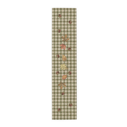 Chestnut & Mushroom fall table runner, olive green gingham with chestnuts and autumn leaves, on a laid dining table