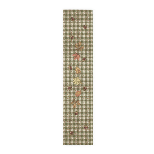 Chestnut & Mushroom fall table runner, olive green gingham with chestnuts and autumn leaves, on a laid dining table