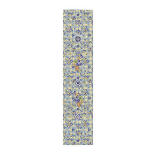 Grape & Pumpkin fall table runner, purple grapes and vine leaves on blue and yellow gingham, on a wooden dining table