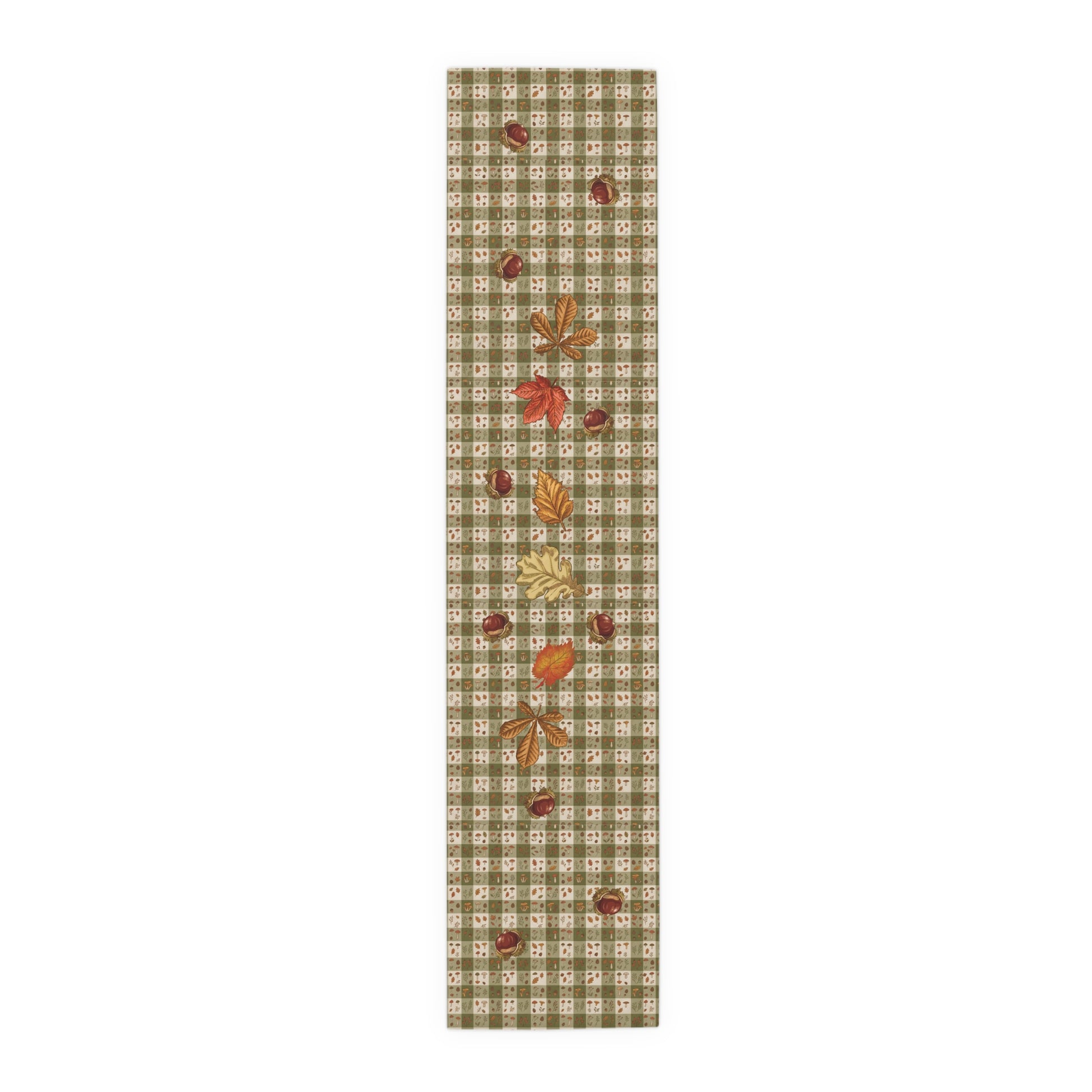 Chestnut & Mushroom fall table runner, mushrooms and acorns across a green check, on a wooden table