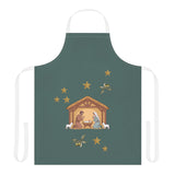 Nativity & Olive Christmas apron laid flat, a nativity stable with gold stars and olive sprigs on deep green