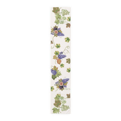 Fig & Grape fall table runner, halved fig and vine leaves on a cream ground, set for autumn
