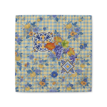 Grape & Pumpkin fall cloth napkin, grapes and pumpkins on blue and yellow gingham, folded on a plate
