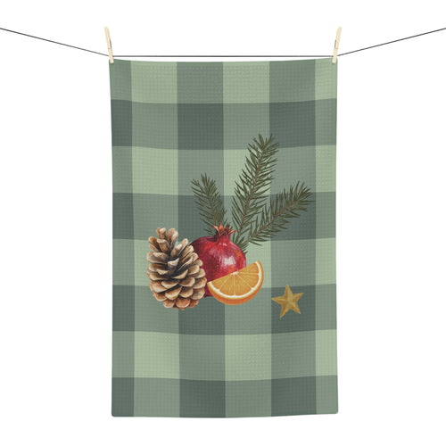 Pomegranate & Pine Gingham Christmas tea towel, a pomegranate, pine cone, orange slice and gold star under a pine spray on a sage green gingham check