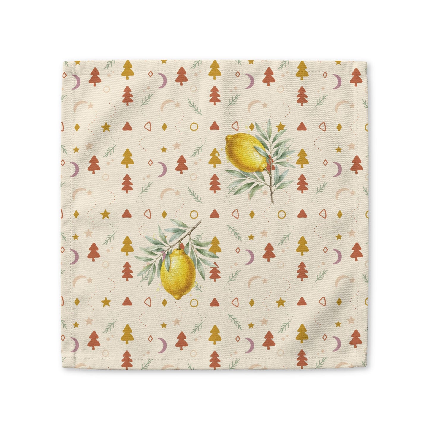 Lemon and pine Christmas cloth napkin laid flat, with watercolour lemons among small rust and gold Christmas trees, stars and crescent moons on cream