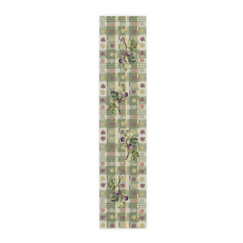 Fig & Maple fall table runner, purple figs and maple leaves on sage green tartan, on a wooden dining table