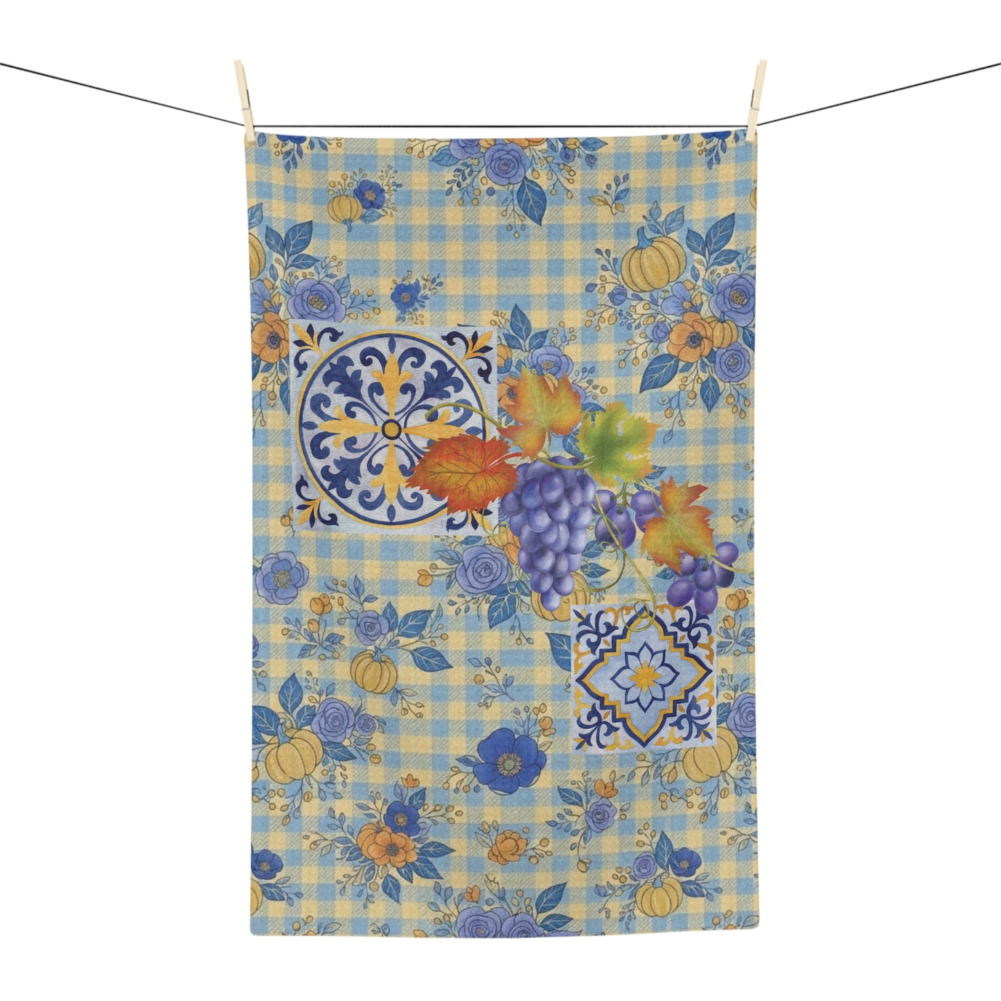 Grape & Pumpkin fall tea towel, grapes and pumpkins on blue and yellow gingham, hanging in a kitchen