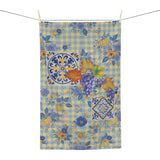 Grape & Pumpkin fall tea towel, grapes and pumpkins on blue and yellow gingham, hanging in a kitchen