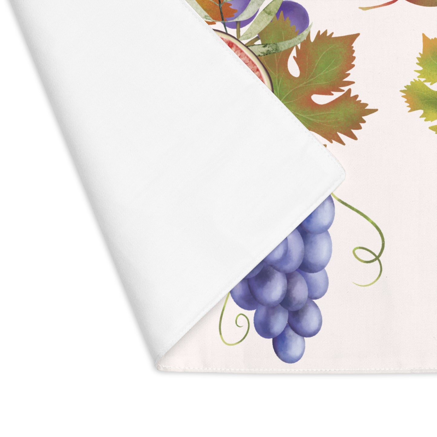 Fig & Grape fall placemat, purple grapes and turning vine leaves, at a laid place setting