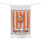 Spritz Club tea towel hanging, showing the orange striped panel with a spritz glass and Spritz Club lettering