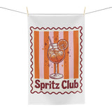 Spritz Club tea towel hanging, showing the orange striped panel with a spritz glass and Spritz Club lettering