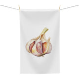 Garlic tea towel hanging, showing the watercolor garlic bulb print