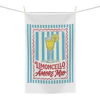 Limoncello Amore Mio tea towel hanging, showing the striped panel with the retro Limoncello label