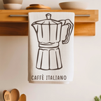Caffè Italiano tea towel folded over a wooden shelf rail above a kitchen counter