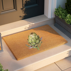 Artichoke doormat on a pale stone step beside a clipped hedge in a planter