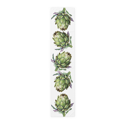 Artichoke table runner in polyester, 16 by 72 inches, laid flat with a repeating watercolor artichoke pattern