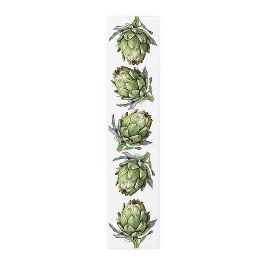 Artichoke table runner in polyester, 16 by 72 inches, laid flat with a repeating watercolor artichoke pattern