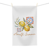 Amalfi Summer tea towel hanging, showing the lemon and blue tile print with Amalfi Summer lettering