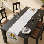 Marché Provençal table runner on a dark wooden table with chairs