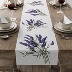Lavender table runner on a laid table with plates and water glasses