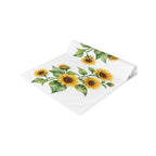 Sunflower table runner folded, showing the sunflower print up close and the hemmed edge