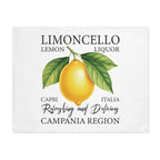 Limoncello placemat laid flat, showing the lemon liquor label with a lemon on the branch on white cotton twill