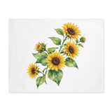 Sunflower placemat laid flat, showing a bunch of sunflowers on white cotton twill