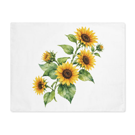 Sunflower placemat laid flat, showing a bunch of sunflowers on white cotton twill