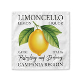 Limoncello cloth napkin laid flat, showing a watercolor lemon and leaves on a Capri lemon liquor label