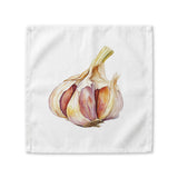 Garlic cloth napkin laid flat, showing a single watercolor garlic bulb cut open to reveal purple-pink cloves