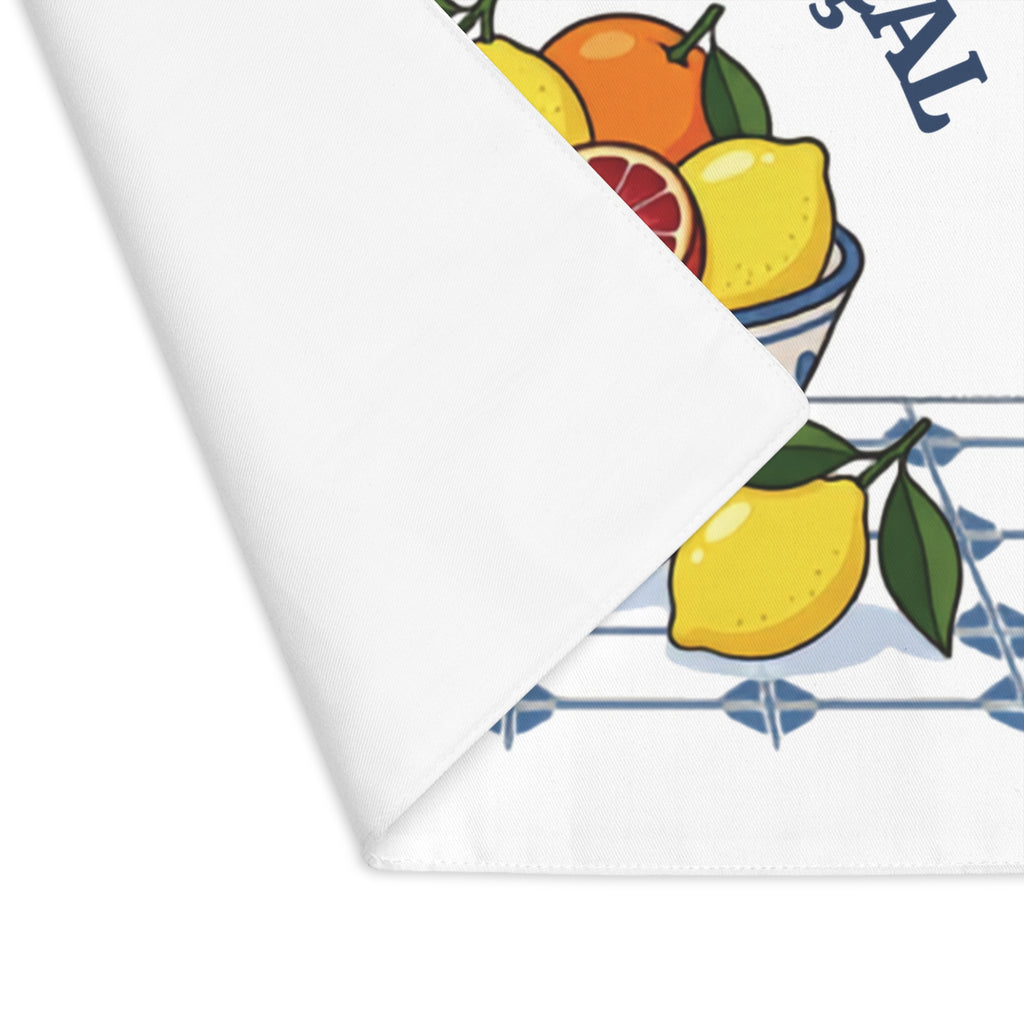 Marché Provençal placemat with one corner turned back, showing the hemmed edge and the plain reverse
