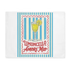 Limoncello Amore Mio placemat, showing a red-framed label with a limoncello coupe on blue and cream stripes