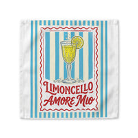 Limoncello Amore Mio cloth napkin, showing a red-framed label with a limoncello coupe on blue and cream stripes