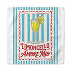 Limoncello Amore Mio dinner napkin, 22 inch, the red-framed label on blue and cream stripes centered on white cotton