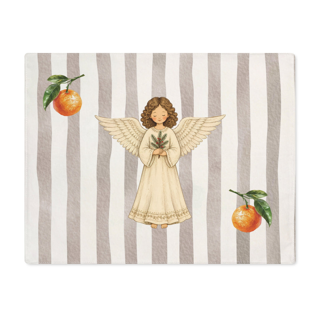 Angels and oranges Christmas placemat laid flat, with the angel and pine sprig on a soft grey stripe and an orange above and below