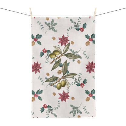 Poinsettia and olive Christmas kitchen towel hanging from a line, showing the full pattern