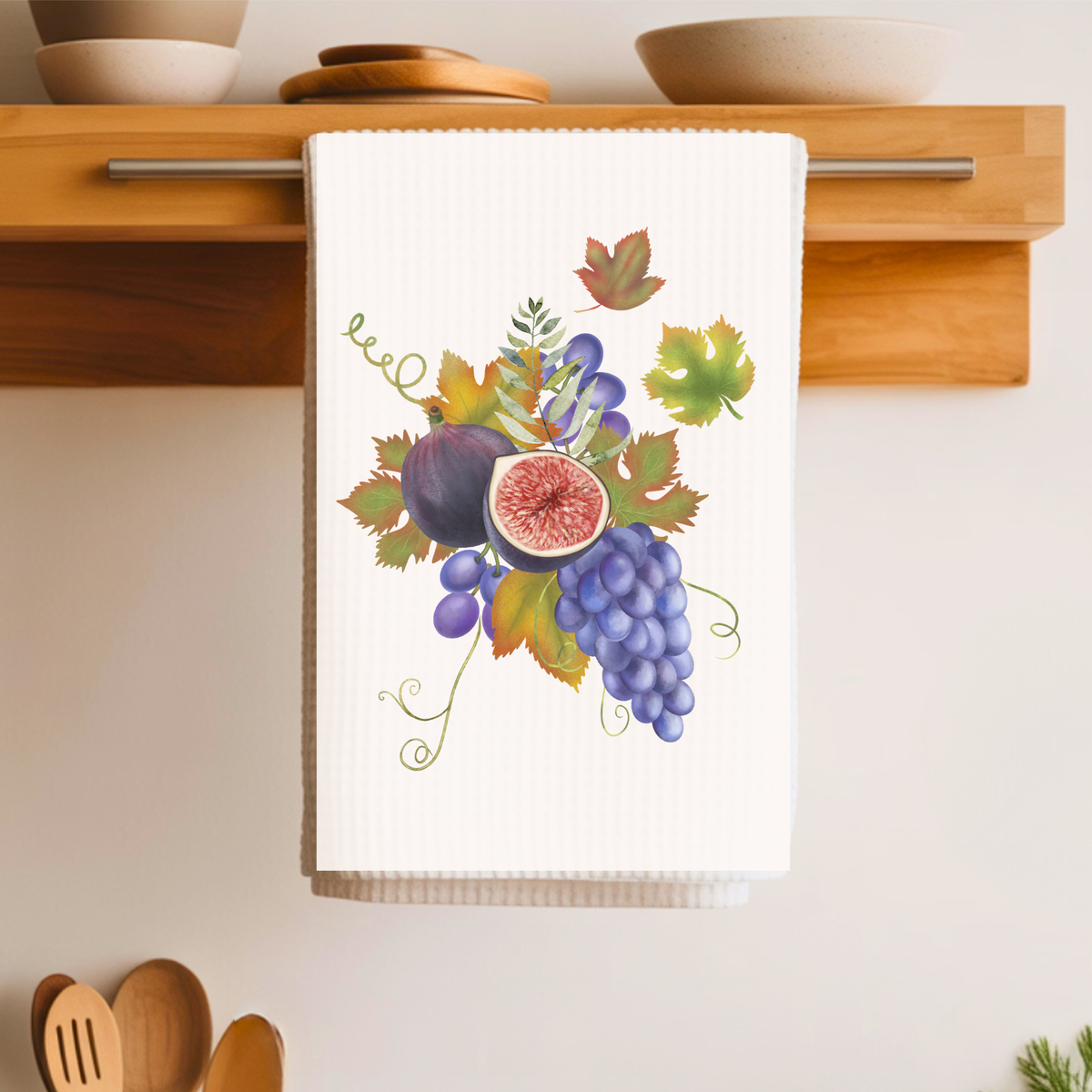 Fig & Grape fall tea towel, artwork detail of a halved fig and vine leaves