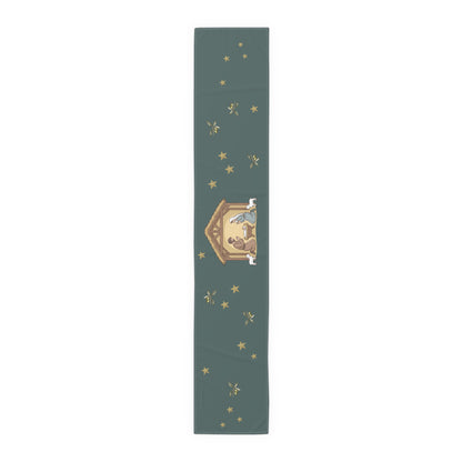 Nativity & Olive Christmas table runner at a place setting, a gold star and an olive sprig on deep green