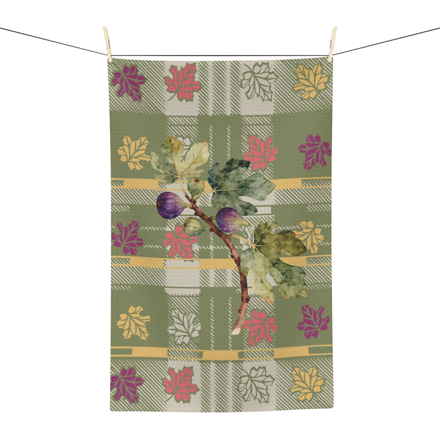 Fig & Maple fall tea towel, figs and maple leaves on sage green tartan, hanging in a kitchen