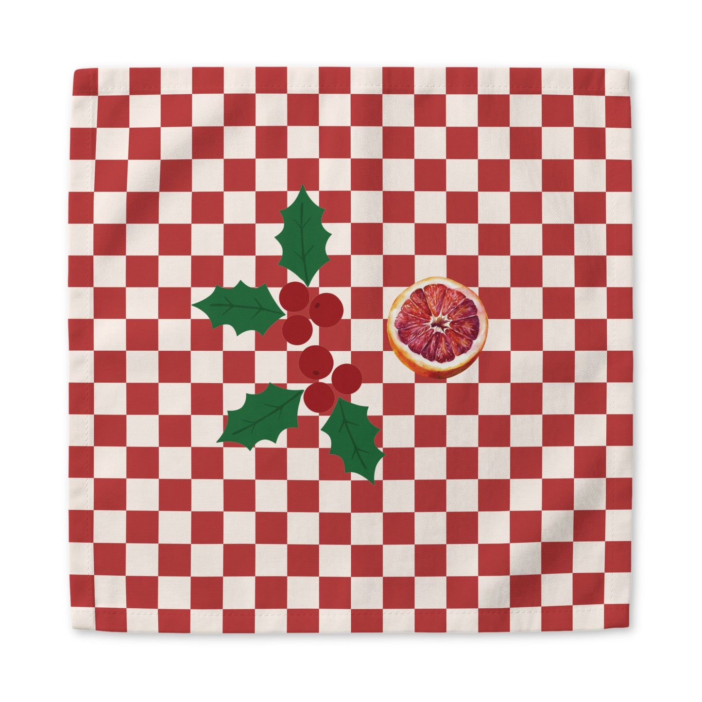 Blood orange check Christmas napkin laid flat, the check running out to the hemmed edge