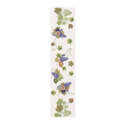 Fig & Grape fall table runner, watercolour figs and grapes on cream, on a laid dining table
