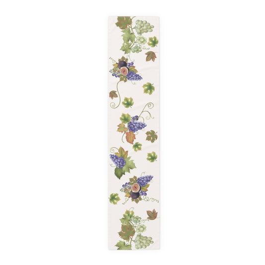 Fig & Grape fall table runner, watercolour figs and grapes on cream, on a laid dining table
