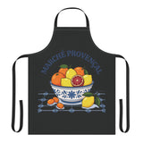 Marché Provençal apron laid flat, showing the blue-and-white bowl of citrus fruit on a black body