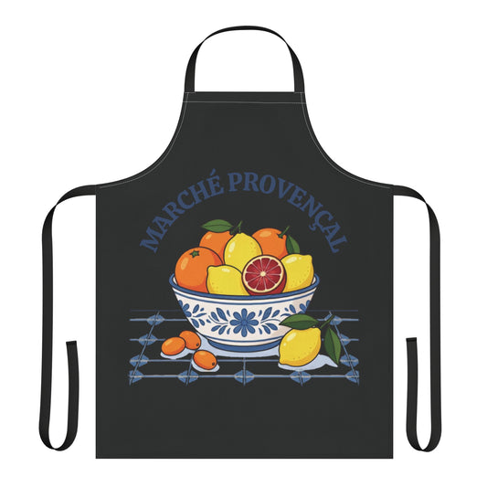 Marché Provençal apron laid flat, showing the blue-and-white bowl of citrus fruit on a black body