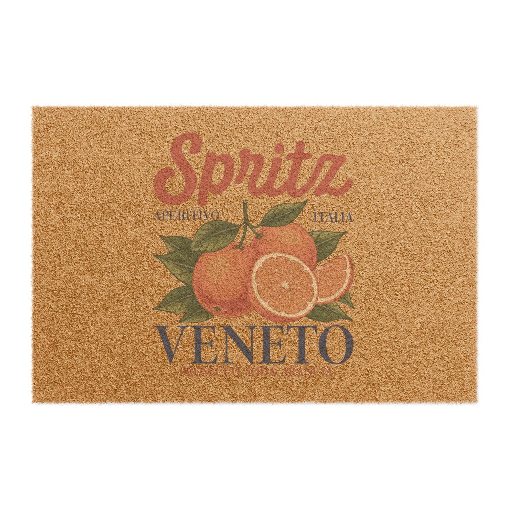 Spritz Veneto coir doormat seen from above on a plain background, showing the Spritz Veneto label print with oranges on natural coir