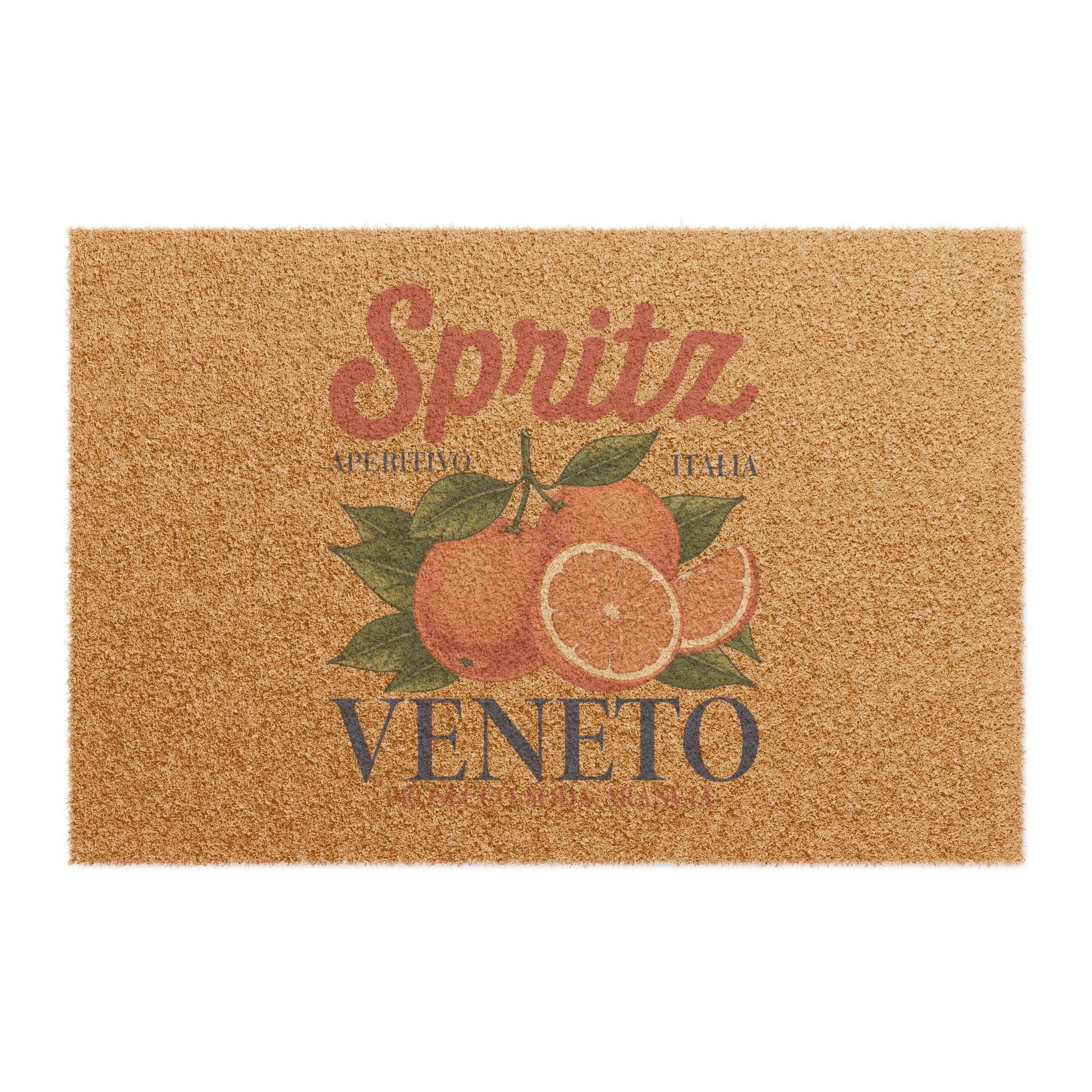 Spritz Veneto coir doormat seen from above on a plain background, showing the Spritz Veneto label print with oranges on natural coir